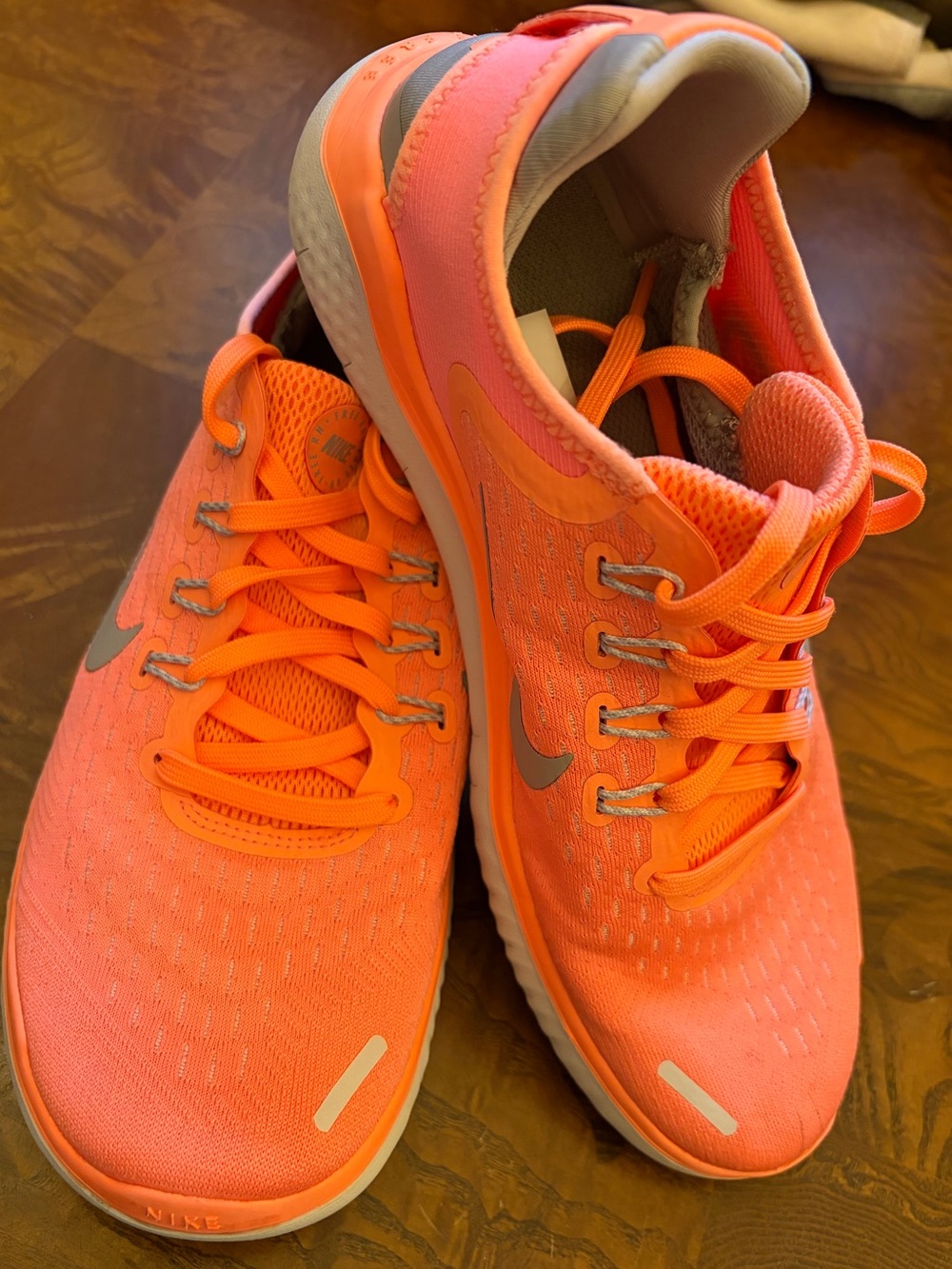 Nike Women’s Athletic Shoes - Bright Coral orange with Silver Swoosh